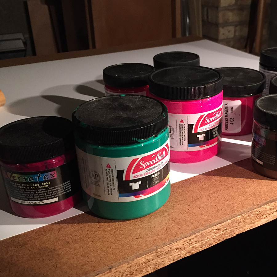 different screen printing inks on a work table